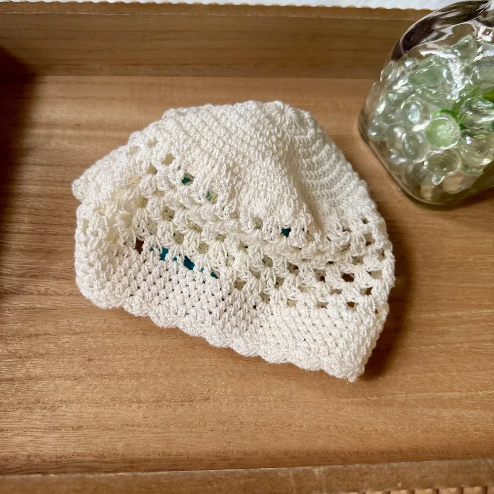 White Crochet Baby Hat With Multicolor Satin Flower Appliqué‎